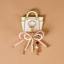 BOW PEARL BAG CHARM